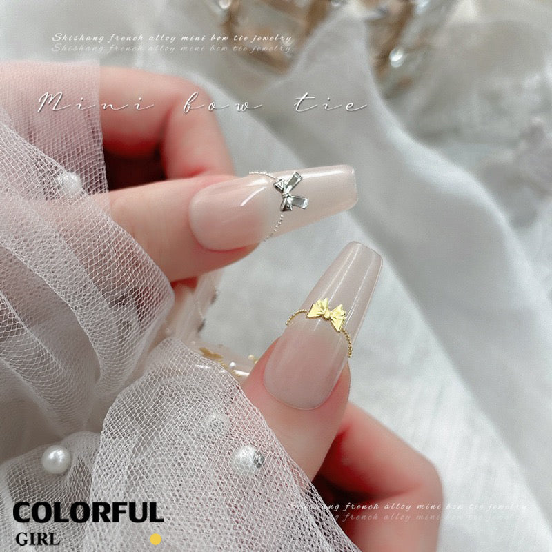 อุปกรณ์ตกแต่งเล็บโบว์น่ารัก 🎀｜ชุดโบว์แต่งเล็บทั้งกล่อง 💖｜คุ้มค่าคุ้มราคา！🌈 โทนสีพาสเทลหวานละมุน｜กล่องจัดเก็บโบว์ 12 ช่อง ✨｜ชุดโบว์เรซิ่นหลากสีสำหรับแต่งเล็บ｜อุปกรณ์ตกแต่งเล็บ DIY 💅｜วัสดุแต่งเล็บสไตล์สาวน่ารัก